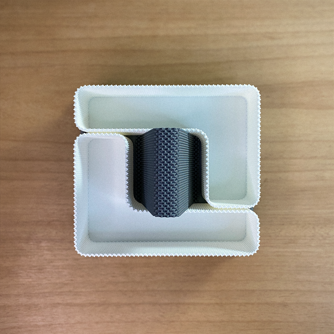 Coregrid Glasses Holder — 3D printed eyewear holder with integrated storage tray, overhead view, white and grey RippleMesh texture — Creative3D Novelties