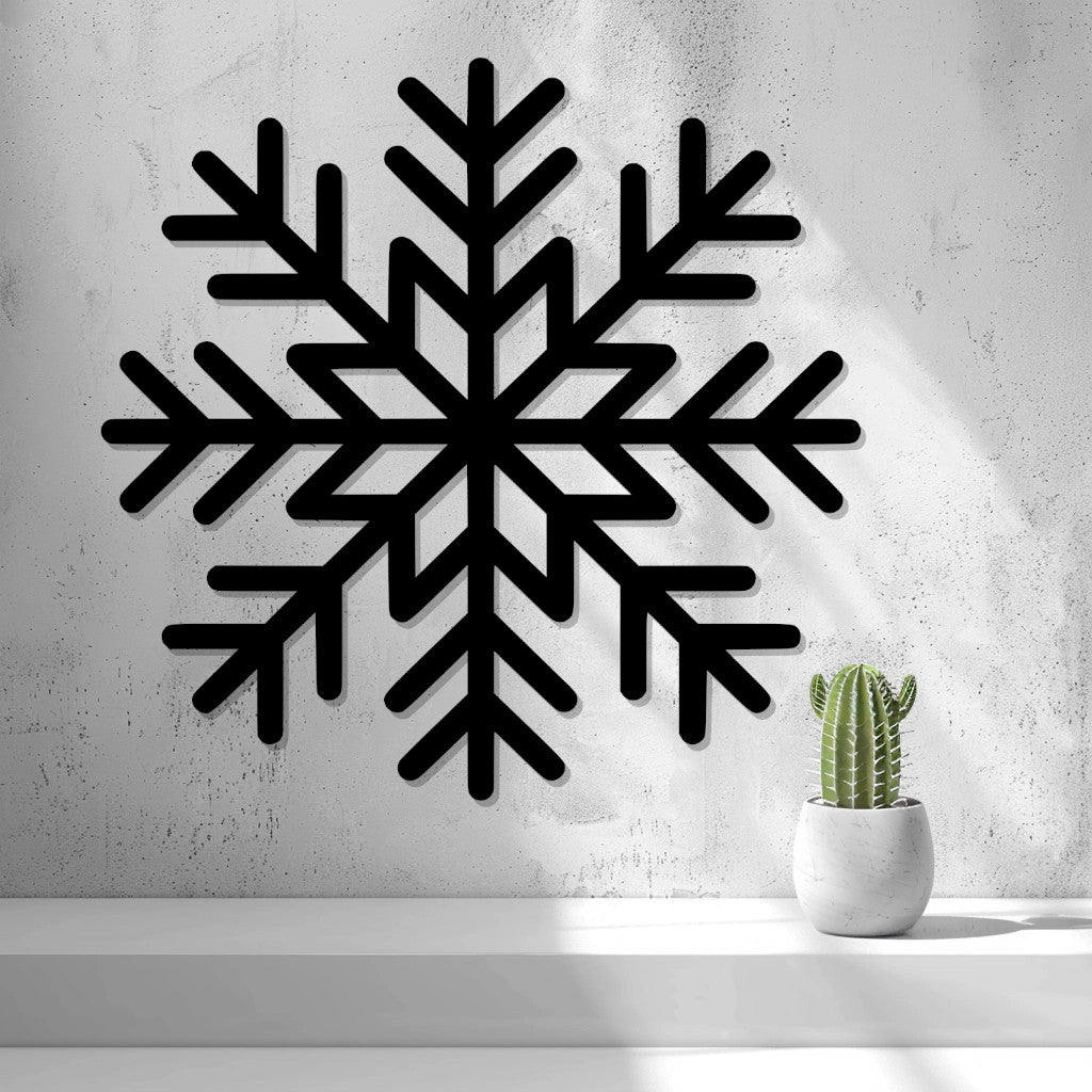 Snowflake Wall Art in black — 3D printed geometric design, shown against a textured wall — Creative3DNovelties
