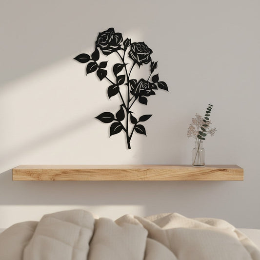 Black 3D printed rose wall art mounted on a warm grey wall above a natural oak floating shelf in a minimal Scandinavian bedroom, with dried eucalyptus in a glass vase, UK made